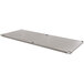 A galvanized steel undershelf with screws for an Advance Tabco adjustable work table.