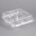 A Polar Pak clear plastic hinged cupcake container with four compartments.