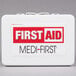 A white Medique vehicle first aid kit with red and white text.
