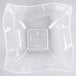 A close-up of a clear square shaped Fineline plastic bowl.