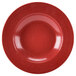 A close up of a textured red melamine bowl.