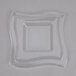 A clear square lid with a wavy design on a white surface.