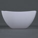 A close up of a Fineline white plastic bowl with a curved edge.