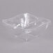 A clear plastic Fineline bowl with a clear square lid.