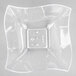 A clear square shaped bowl.
