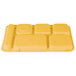 A yellow rectangular Cambro serving tray with six compartments.