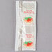 A small white packet of Italian dressing with red and green images on it.