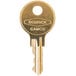 A close-up of a gold Bobrick cabinet door key with the words "Bobrick" and "Gamo" on it.
