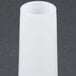 A white cylindrical object.