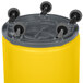 A yellow Continental Huskee barrel with wheels.