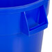 A blue plastic Continental recycling trash can with a lid.