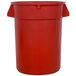 A red plastic Continental Huskee trash can with a lid.