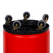 A red Continental Huskee round trash can with black wheels.