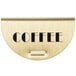 A gold brass half-moon sign with black text reading "Coffee / Decaf"