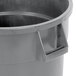 A close-up of a gray plastic Continental Huskee trash can with a lid.