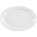 A white oval china platter with a circular rim.