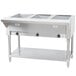 An Advance Tabco stainless steel electric steam table with three pans on a counter.