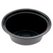 A black plastic Newspring Ellipso souffle bowl with a black lid.