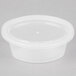 A clear plastic Newspring Ellipso souffle container with a lid.
