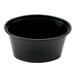 A black Newspring oval plastic souffle cup.