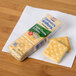 A Lance Sandwich Crackers variety pack on a table with a napkin.
