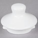 The white lid for a Tuxton white china teapot with a white plastic knob.