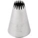 An Ateco 867 French star piping tip, a silver metal cone with a star shaped design on the end.
