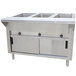 A stainless steel Advance Tabco hot food table with three enclosed drawers.