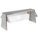 An Advance Tabco stainless steel buffet shelf with a clear sneeze guard over food on a stainless steel counter.
