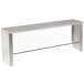 A long stainless steel table shelf with a clear sneeze guard.