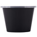 A black Pactiv Newspring Ellipso plastic souffle container with a clear lid.