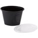 A black Pactiv plastic oval souffle container with a lid.