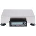 A Cardinal Detecto legal for trade digital scale on a counter with a display.