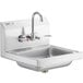 A Regency stainless steel wall mounted hand sink with gooseneck faucet and wrist blades.