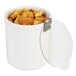 A white Cal-Mil round jar lid on a white round jar filled with croutons.