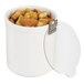 A white Cal-Mil round melamine jar lid on a white container full of croutons.