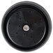 A black round plastic object with holes.