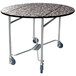 A Lakeside round room service table with wheels and a stone top.