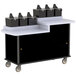 A black Lakeside condiment cart with black boxes on top.