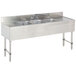 A stainless steel Advance Tabco bar sink with three compartments and two 12" drainboards.