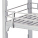 A white metal Cambro double level shelf rail on a white Cambro shelf.