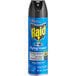 A blue and black aerosol can of Raid Flying Insect Killer being sprayed in a room.