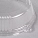 A clear plastic container with a WNA Comet clear plastic lid.