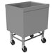 A stainless steel rectangular box with wheels.