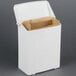A white plastic wall-mount sanitary napkin receptacle with a brown bag inside.