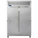 A Traulsen stainless steel 2-section reach-in freezer with two solid doors.