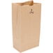 A Duro brown paper bag with black text on it.