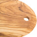 An American Metalcraft oval olive wood serving board with a circular hole in the surface.