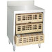 A stainless steel Advance Tabco flat top glass rack storage unit with baskets inside.
