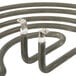 A pair of metal heating elements with coils on each end.
